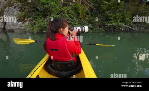 photographing kayak