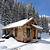 picture of log cabin in winter