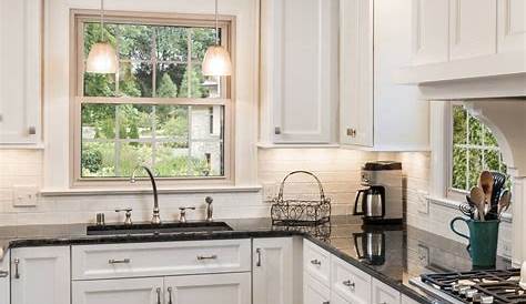 Pictures Of White Kitchen Cabinets With Black Granite Countertops Countertop Is Bold Contrast In