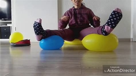 pictures of guy sit on balloons