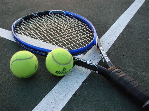 pictures of tennis racquets and balls