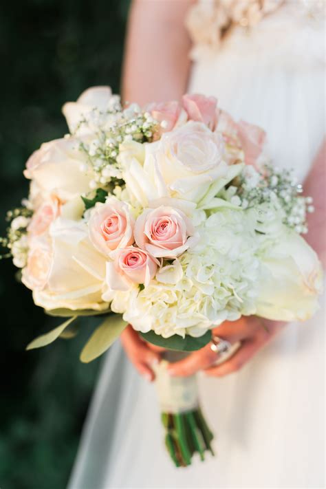 Bridal bouquet of white and pink roses. By Floribunda Designs. White and pink roses, Pink