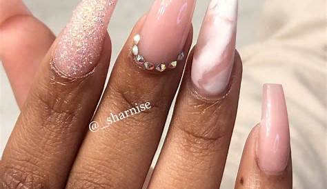Pink Marble Nails With Glitter These classy designed finished will