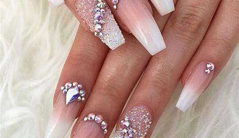 Pale pink ombre nails with tons of rhinestones. Did this for my