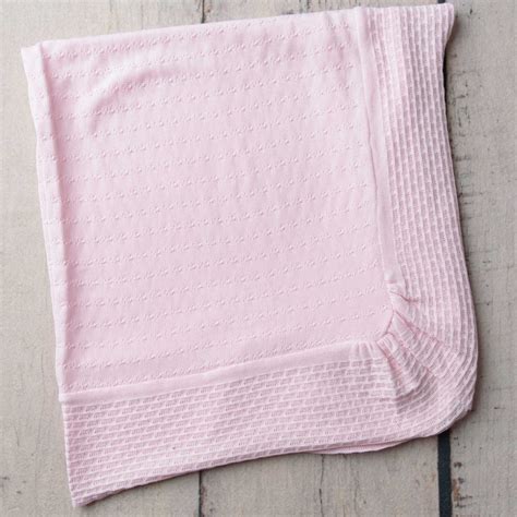 pink knitted baby blanket