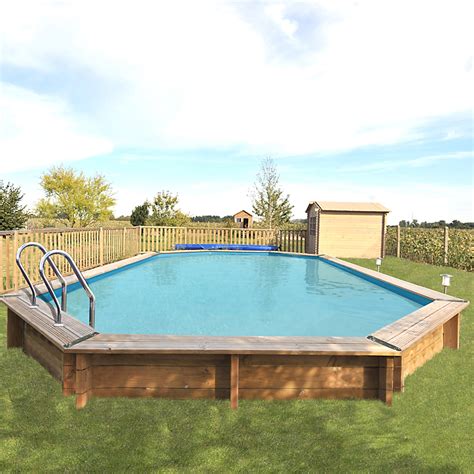 Construction piscine 9×4 bâche à barres et douche solaire Lyneo Piscines
