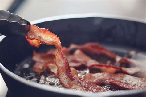 Bacon strips in pan