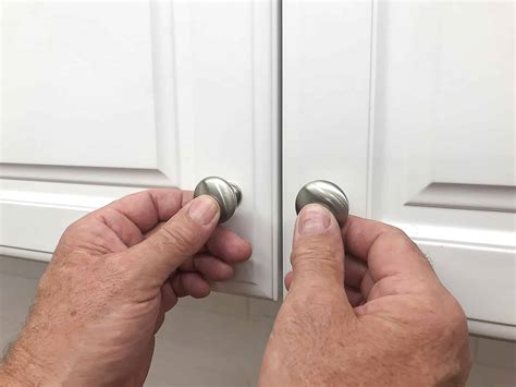placing knobs on cabinet doors