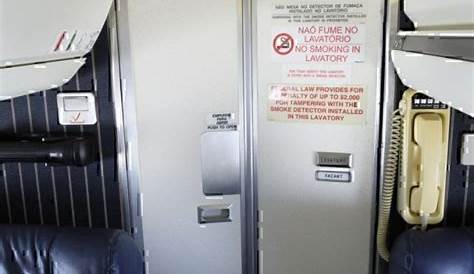 Door inside the toilet of an airplane Stock Photo