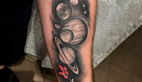 Black and grey tattoo of the Solar System inked on