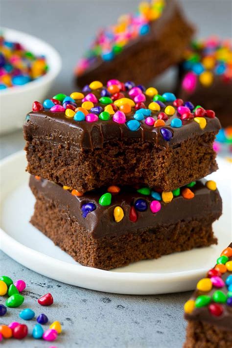 plate of fudge brownies with sprinkles