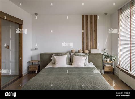 play with textures and patterns in bedroom with oak furniture