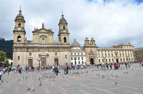 Bolivar Square Bogota Mind the pigeons! Cuidado con las palomas en