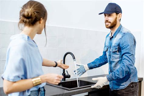 Plumber Explaining to a Customer