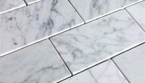Pietra Carrara Subway Tile is an exquisite marblelook white porcelain