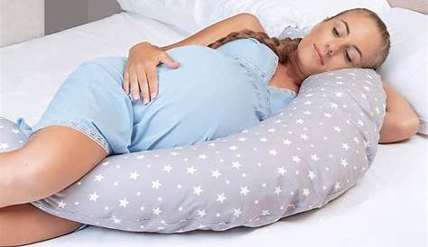 Comment dormir avec un coussin d'allaitement on vous dit