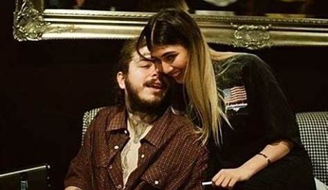 Singer Post Malone is caught in a rare display of affection with