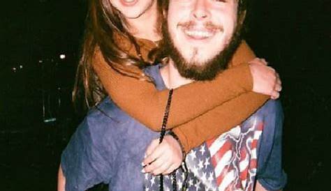 Singer Post Malone is caught in a rare display of affection with