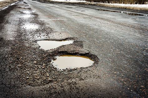 pothole caused by traffic