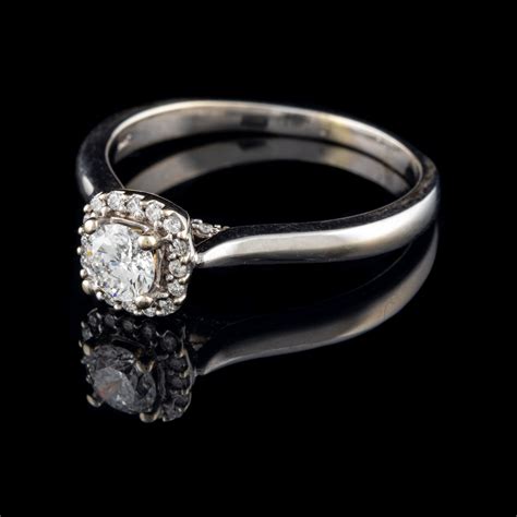 pre owned halo engagement rings