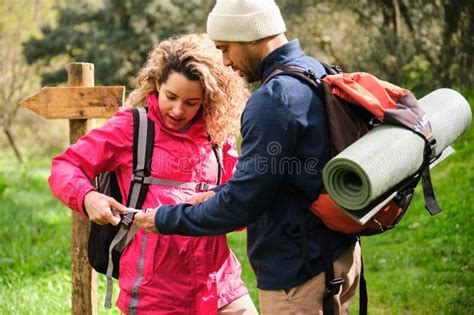 Preparing gear for a mountain hike