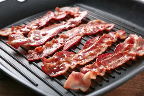 Preparing the grill for bacon