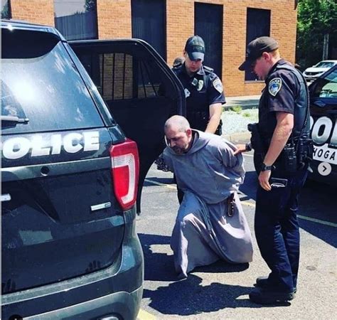 priest arrested for praying