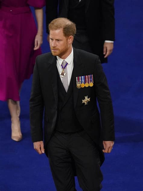 prince harry arrives at father's coronation