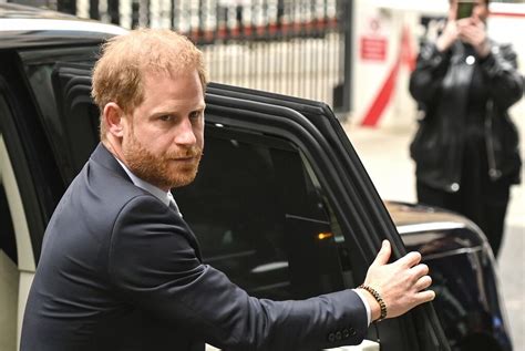 prince harry settles phone-hacking
