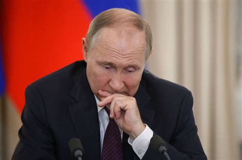 Putin 'to undergo cancer operation and hand power to hardline exspy