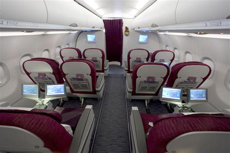 qatar airways how to upgrade to business