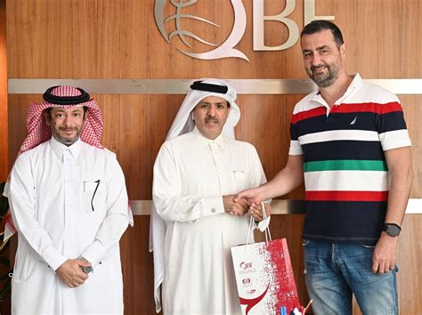 Qatar's basketball players celebrate winning the gold medal of men's