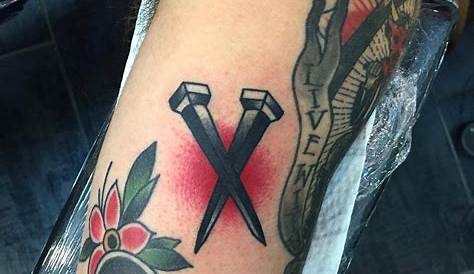 railroad spike cross tattoo