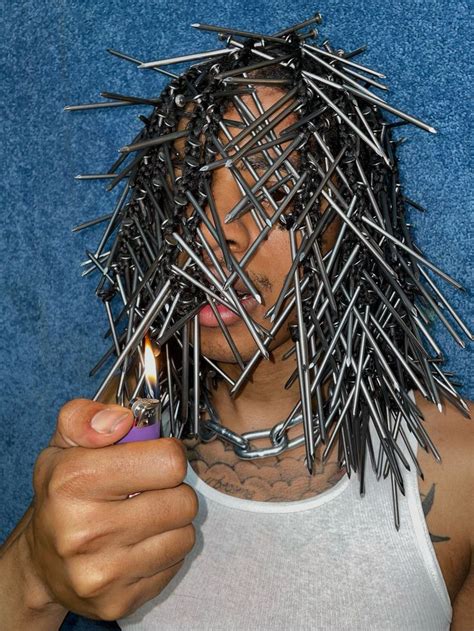 rapper with nails as hair