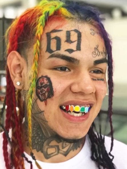 Rapper With Tattoos On Face