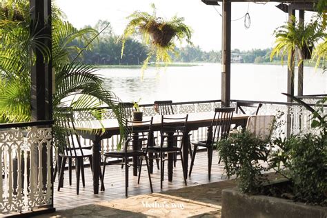 Discover Serene Beauty: Sun Rays Dancing on the River's Reflection