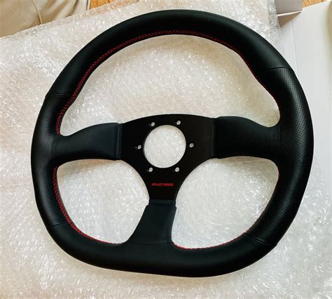 re amemiya steering wheel rx7