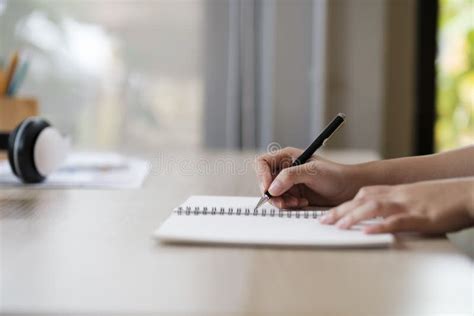 reading a book and taking notes