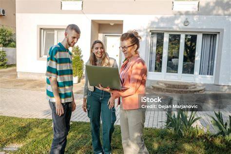Real estate agent using laptop