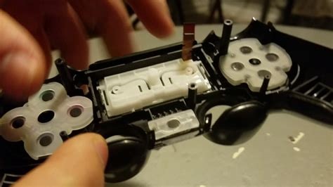 PS4 controller being reassembled