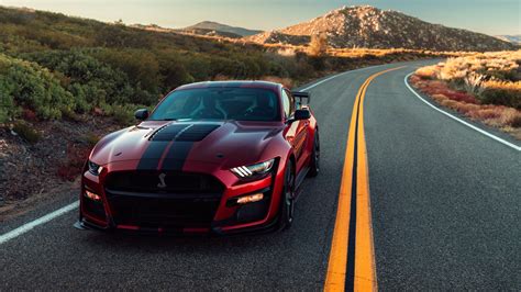 red and black ford mustang shelby gt500