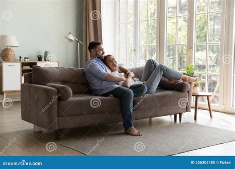 relaxing on couch image