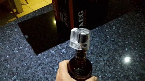 Remove Security Cap Liquor Bottle