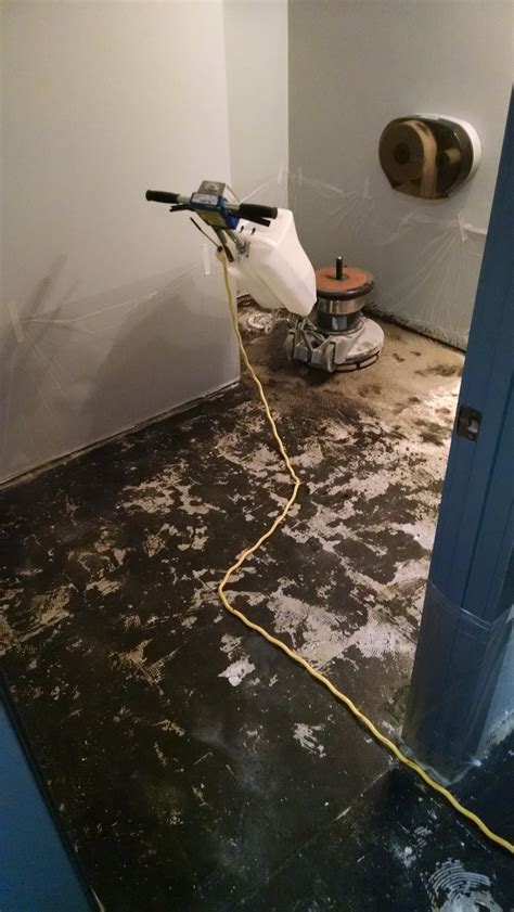 removing mastic from cement floor