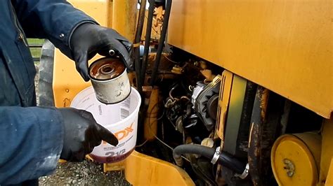 Replace Fuel Filter On John Deere 310C Backhoe