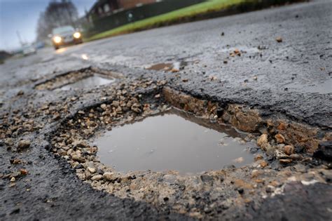 reporting potholes uk