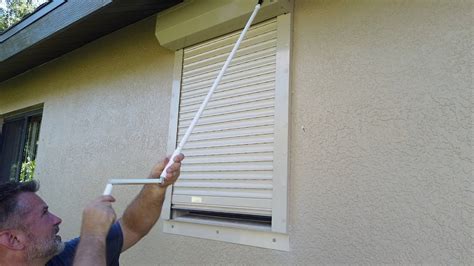 retractable hurricane shutter repair