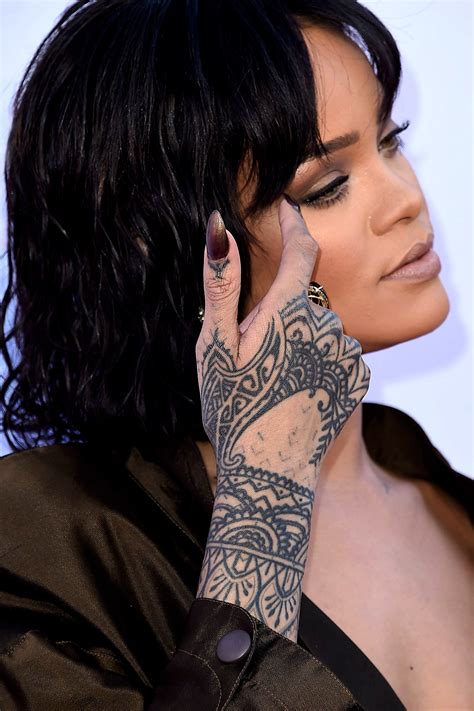 Everything You Need To Know About Rihanna's Tattoo On Her Shoulder