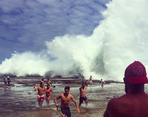 rogue wave hits beach