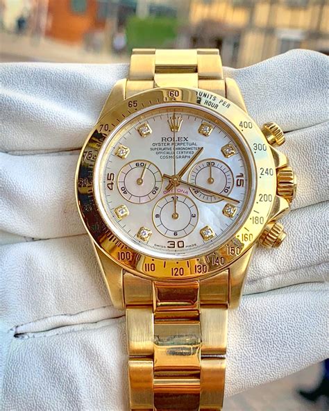 rolex daytona gold diamond